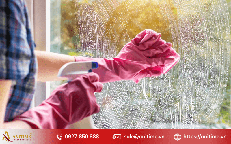 tẩy xi măng trên kính